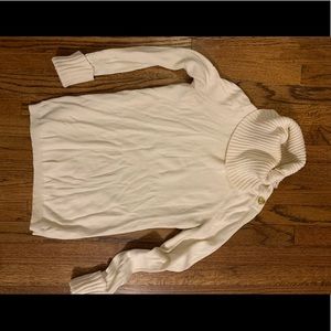 White turtleneck with gold detailing